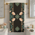 Close up of black peach teal gold floral beach towel on gold rack showing size
