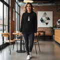 Gorgeous Caucasian woman in black hoodie with geometric triangles