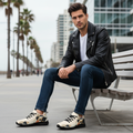 Man in black leather jacket with geometric shoes