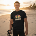 Treasure Hunter black classic tee with retro sunset stripes and metal detector graphic - ideal for outdoor explorers and adventure lifestyle